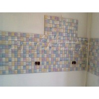 Облицовка кухонного фартука кафельной плиткой размером 10x10