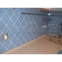 Облицовка кухонного фартука кафельной плиткой диагональ